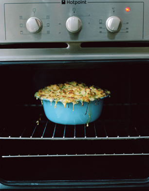 Pie in blue dish in the oven