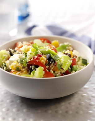 Leek pomegranate cous cous salad