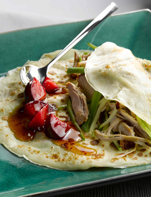 Crepes with maple glazed pulled pork and plum and maple syrup sauce