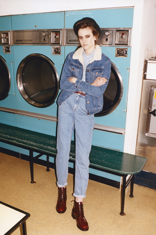 model wears denim jacket, jeans and loake boots for topshop