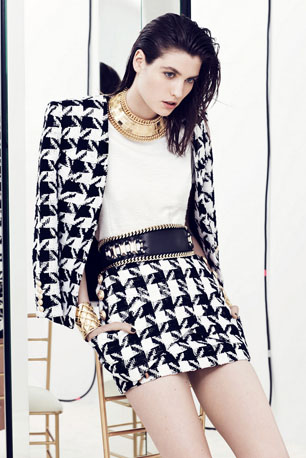 model wears black and white suit by Balmain Resort 2014