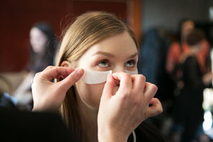 model getting skyn ICELAND Eye Mask applied 