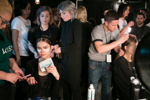 models backstage at New York Fashion Week
